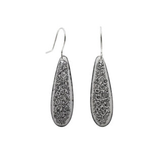 Long white earrings with black design hand drawn