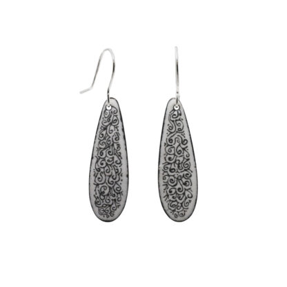 Long white earrings with black design hand drawn